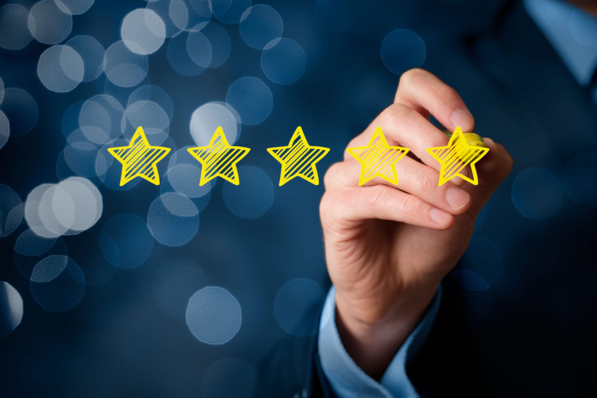 businessman drawing five yellow star businessman drawing five yellow star